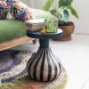 imageCreative CoOp Round Mango Wood Side Table with Striped Base Black and Natural