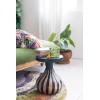 imageCreative CoOp Round Mango Wood Side Table with Striped Base Black and Natural
