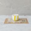 imageCreative CoOp Round Soda Glass TealightVotive Holder with Stripes White and Yellow