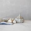 imageCreative CoOp Matte White Stoneware Shaped GarlicOnion Keeper 75 round