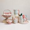 imageCreative CoOp HandPainted Stoneware Pedestal with Stripes Red and Cream Color