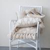 imageCreative CoOp Two Sided Linen Blend Tufted Lumbar Pillow with Button and Fringe Natural and BlueCover with Polyester Insert