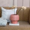 imageCreative CoOp Embossed TerraCotta Footed VasePlanter with Crackle Glaze Coral