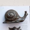 imageCreative CoOp Cast Metal Snail Accent Dcor Rust