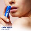 imageNIVEA Moisture Lip Care Lip Balm Stick with Shea Butter Jojoba Oil and Avocado Oil 017 Oz Pack of 4Moisture Lip Care