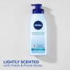 imageNIVEA Lightly Scented Breathable Body Lotion Body Lotion for Dry Skin Pack of Three 135 Fl Oz Pump BottlesLightly Scented