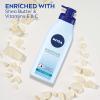 imageNIVEA Lightly Scented Breathable Body Lotion Body Lotion for Dry Skin Pack of Three 135 Fl Oz Pump BottlesLightly Scented