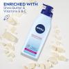 imageNIVEA Lightly Scented Breathable Body Lotion Body Lotion for Dry Skin Pack of Three 135 Fl Oz Pump BottlesTropical Breeze