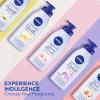 imageNIVEA Oil Infused Cherry Blossom and Jojoba Oil Body Lotion NonGreasy Cherry Blossom Scented Lotion Moisturizes for 24 Hours 169 Fl Oz Pump BottleCherry Blossom