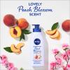 imageNIVEA Oil Infused Cherry Blossom and Jojoba Oil Body Lotion NonGreasy Cherry Blossom Scented Lotion Moisturizes for 24 Hours 169 Fl Oz Pump BottlePeach
