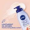 imageNIVEA Oil Infused Cherry Blossom and Jojoba Oil Body Lotion NonGreasy Cherry Blossom Scented Lotion Moisturizes for 24 Hours 169 Fl Oz Pump BottlePeach