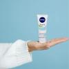 imageNivea Soft Refreshingly Moisturizing Face Body and Hand Cream 3 Pack of 68 Oz JarsFresh