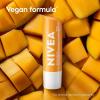 imageNIVEA Mango Lip Care Vegan Lip Balm Pack with Shea Butter Nourishing Oils and Vitamin C ampamp E 3in1 Moisturize Repair and Protect 017 Oz Stick Pack of 4Mango