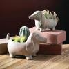 imageSullivans Dachshund Dog Planter Set of 2 Distressed Terracotta Bronze for Indoor and Outdoor Flower Garden Statue Decor