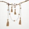 imageSullivans 65 ft Neutral Wood Bead ampamp Black Tassel Garland Set of 2 Artificial Greenery Versatile Garland Decor for All Seasons Perfect for Weddings Fireplace Mantels Dining and Living RoomsWhite  Tan