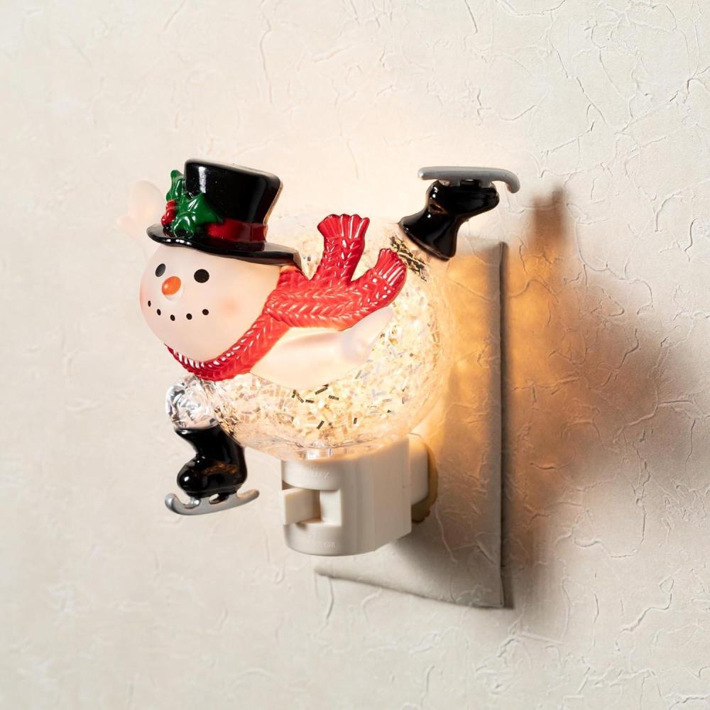 imageSullivans 5quot H Ice Skating Snowman Nightlight Multicolored  for Bathroom Bedroom Holiday DecorationsIce Skating Snowman