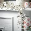 imageSullivans 5 White Cypress Garland Christmas Decor Artificial Greenery Perfect for Fireplace Mantels Dining and Living RoomsGD1473