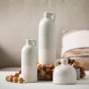 imageSullivans Modern Farmhouse Distressed TwoToned White Small Ceramic Jug Set of Three 3 4 75 10 Tall Crackled Finish Faux Floral Jugs Distressed DecorationWhite