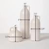 imageSullivans Modern Farmhouse Distressed TwoToned White Small Ceramic Jug Set of Three 3 4 75 10 Tall Crackled Finish Faux Floral Jugs Distressed DecorationWhite