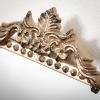 imageELONGATED GOLDTRIMMED MIRROR