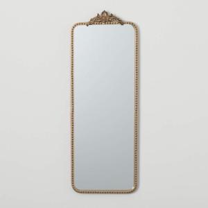 imageELONGATED GOLDTRIMMED MIRROR