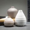 imageSullivans Ceramic Vase Set 3 Small Vases Rustic Home Dcor Modern Farmhouses Ideal Shelf Dcor Table Dcor Bookshelf Mantle White CM2973Multicolor