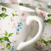 imageSullivans Peacock and Floral Ceramic Mugs Set of 4 Coffee Cups Handles Modern Boho Unique Style For Any Kitchen