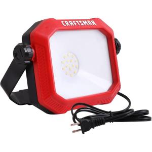imageCRAFTSMAN 1100 Lumens 4000K LED Tiltable Portable Work Light in Red with 2in1 Adjustable Metal Rotating Stand and Handle ImpactResistant Glass Lens 5FT Power Cord ETL Perfect for Job Site