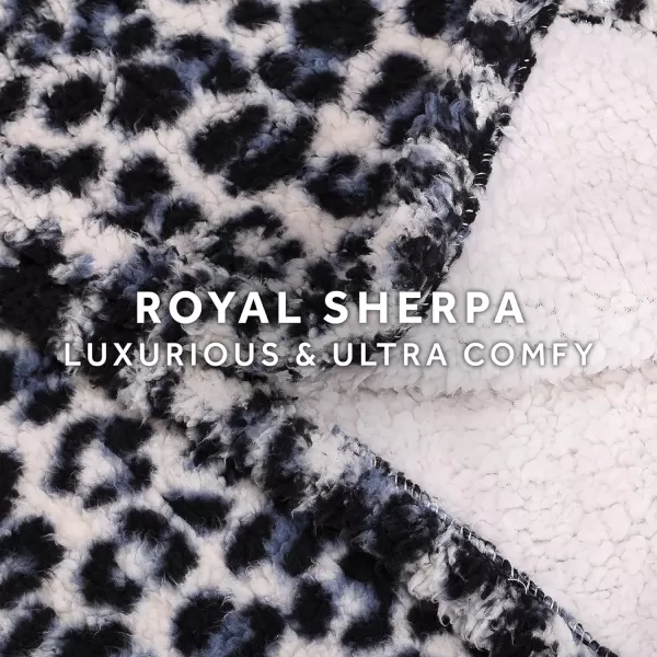 Sunbeam Printed Royal Sherpa Foot Pocket Heated Throw Electric Blanket 50 x 60 4 Heat Settings 4Hour Auto ShutOff Warming Cozy Throw for Couch Sofa or Bed Machine Washable Blue LeopardBlue Leopard