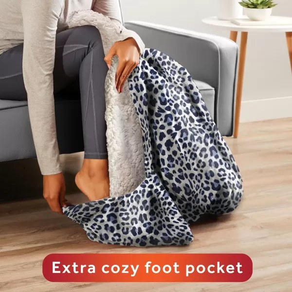 Sunbeam Printed Royal Sherpa Foot Pocket Heated Throw Electric Blanket 50 x 60 4 Heat Settings 4Hour Auto ShutOff Warming Cozy Throw for Couch Sofa or Bed Machine Washable Blue LeopardBlue Leopard