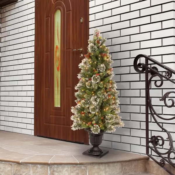 National Tree 26 Inch Wintry Pine Porch Bush with Red Berries Cones and 50 Clear Lights in Decorative Urn WP130024P5 ft