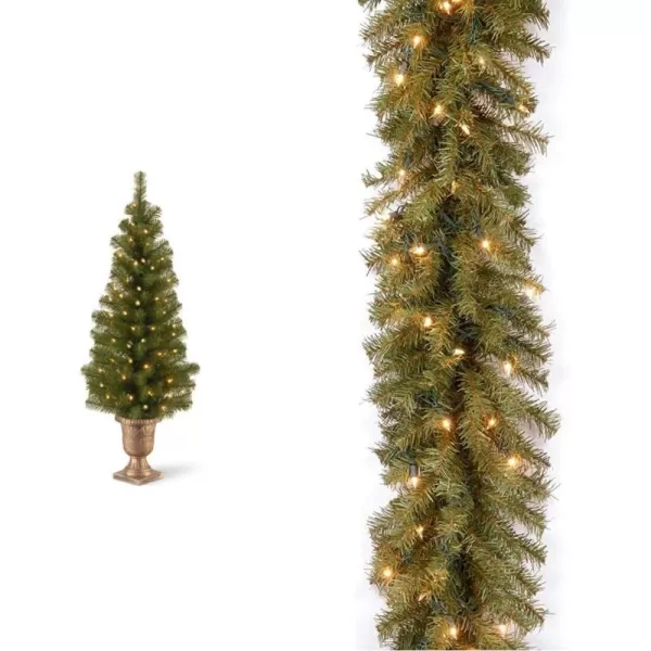 National Tree Company Prelit Artificial Christmas Tree For Entrances  Includes Prestrung White Lights and Stand  Montclair Spruce  5 ft4 ft Tree  Christmas Garland Green