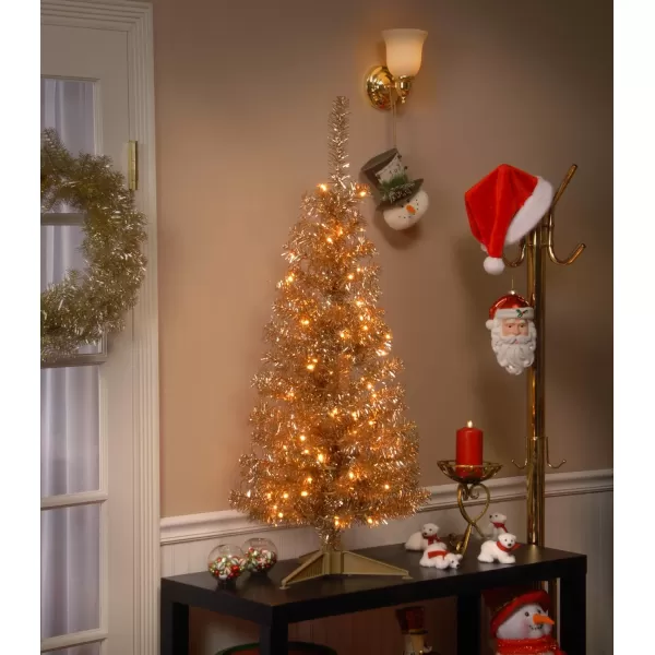 National Tree Company PreLit Artificial Christmas Tree Pink Tinsel White Lights Includes Stand 4 feetChampagne