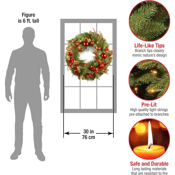 National Tree Company PreLit Artificial Christmas Wreath Green Evergreen White Lights Decorated with Ball Ornaments Red Sprigs Christmas Collection 24 Inches30Inch Pine 30 inch Wreath