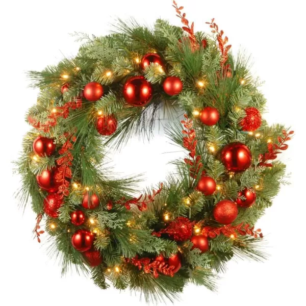 National Tree Company PreLit Artificial Christmas Wreath Green Evergreen White Lights Decorated with Ball Ornaments Red Sprigs Christmas Collection 24 Inches30Inch Pine 30 inch Wreath