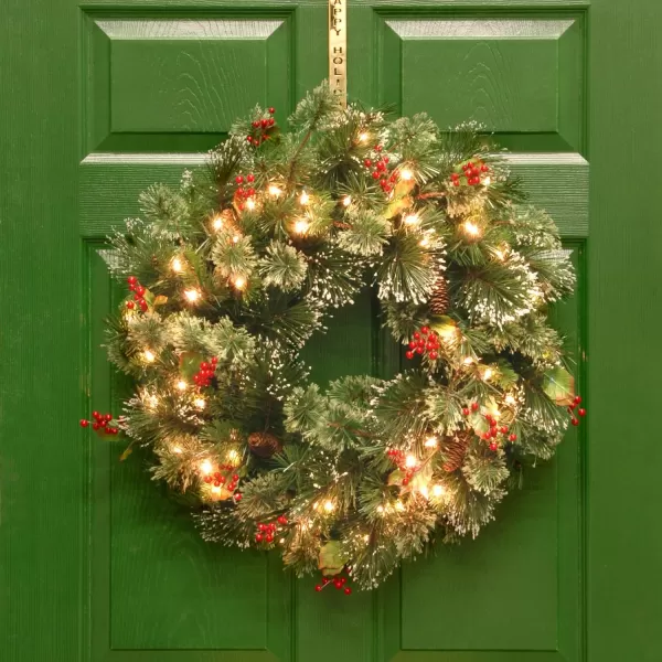 National Tree Company PreLit Artificial Christmas Garland Green Crestwood Spruce White Lights Decorated with Pine Cones Berry Clusters Plug In Christmas Collection 9 FeetPlug In Tree  Wreaths 24 Inches