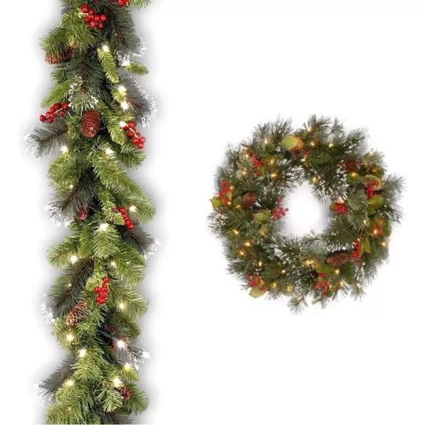 National Tree Company PreLit Artificial Christmas Garland Green Crestwood Spruce White Lights Decorated with Pine Cones Berry Clusters Plug In Christmas Collection 9 FeetPlug In Tree  Wreaths 24 Inches