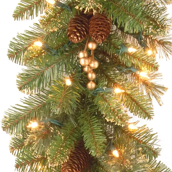 National Tree Company PreLit Artificial Christmas Garland Green Glittery Pine White Lights Decorated With Pine Cones Berry Clusters Plug In Christmas Collection 9 Feet9Feet Green