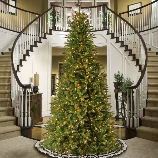 National Tree Company PreLit Artificial Giant Slim Christmas Tree Green Tiffany Fir White Lights Includes Stand 12 Feet12 ft