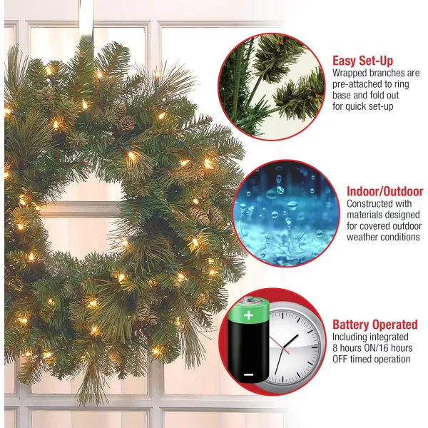 National Tree Company PreLit Artificial Christmas Wreath Green Carolina Pine White Lights Decorated with Pine Cones Christmas Collection 24 Inches24 in Battery Operated