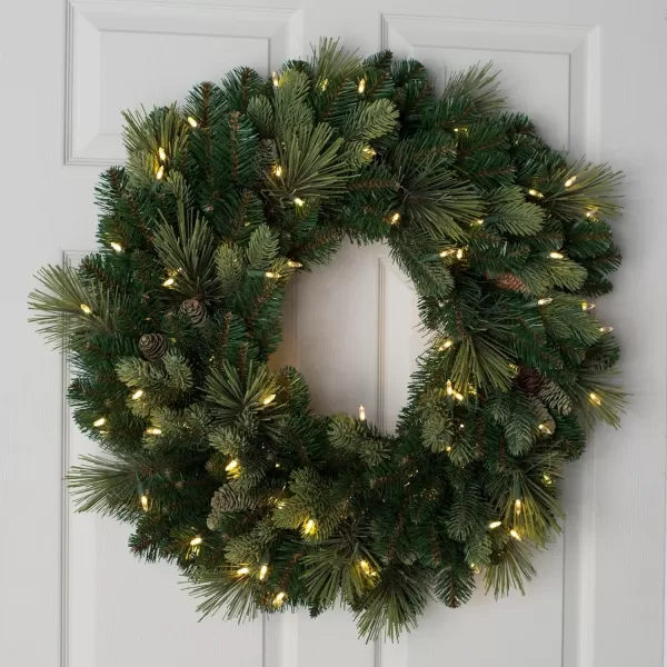 National Tree Company PreLit Artificial Christmas Wreath Green Carolina Pine White Lights Decorated with Pine Cones Christmas Collection 24 Inches30 in Battery Operated