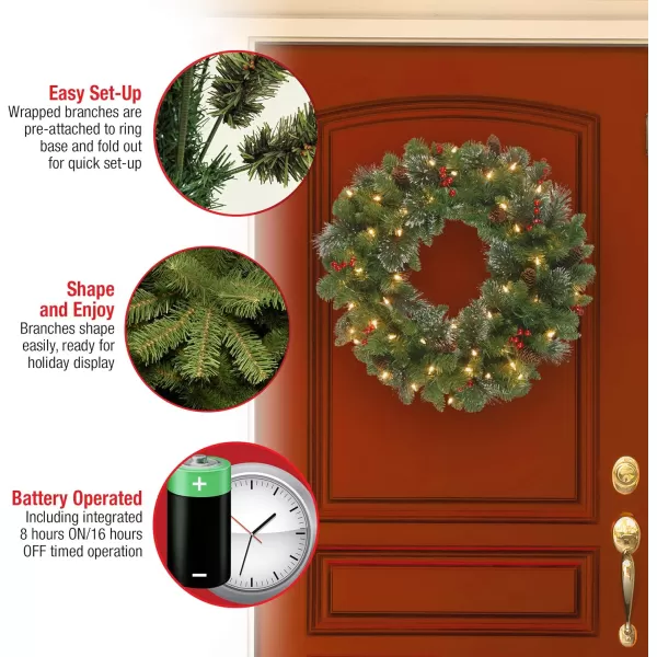 National Tree Company PreLit Artificial Christmas Wreath Green Crestwood Spruce White Lights Decorated with Pine Cones Berry Clusters Christmas Collection 24 Inches30 inch Battery Operated