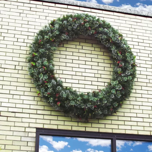 National Tree Company PreLit Artificial Christmas Wreath Green Wintry Pine White Lights Decorated with Pine Cones Berry Clusters Frosted Branches Christmas Collection 60 Inches60 in Wreath