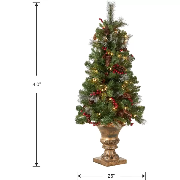 National Tree Company PreLit Artificial Entrance Christmas Tree Green Crestwood Spruce White Lights Decorated with Pine Cones Berry Clusters Frosted Branches Includes Pot Base 5 Feet4 ft Tree