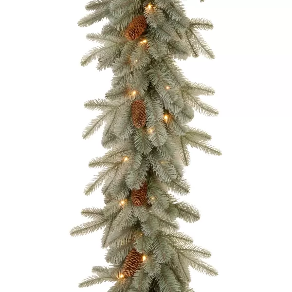 National Tree Company PreLit Feel Real Artificial Christmas Garland Green Arctic Spruce White Lights Decorated With Pine Cones Plug In Christmas Collection 9 FeetGarlands  Forestree3 ft