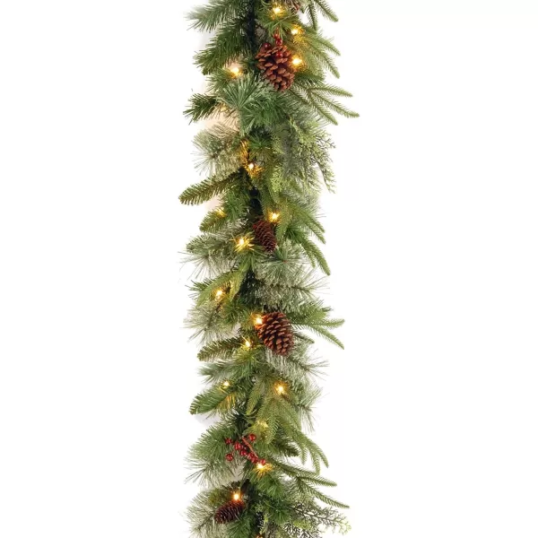 National Tree Company PreLit Feel Real Artificial Christmas Garland Green Colonial Fir White Lights Decorated With Pine Cones Plug In Christmas Collection 9 FeetChristmas Garland  Christmas Wreath