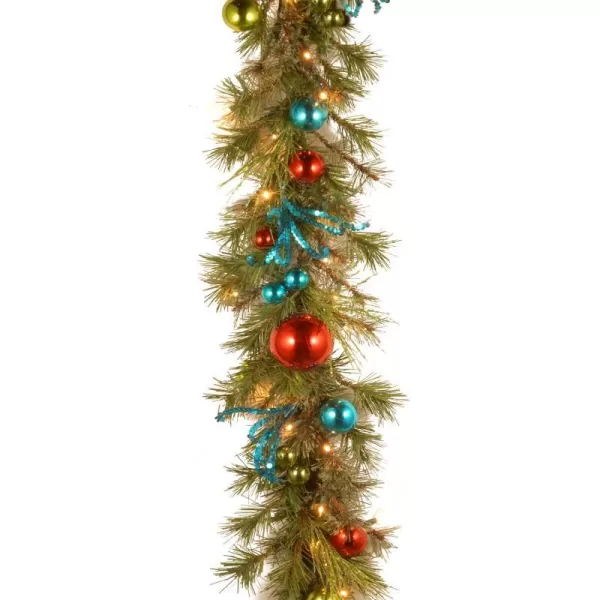 National Tree Company PreLit Artificial Christmas Garland Green Evergreen Decorated With Berry Clusters Ribbon Ball Ornaments Plug In Christmas Collection 9 Feet24Inch Retro Wreath with Ball Ornaments and 50 Battery Operated Warm White LED Light