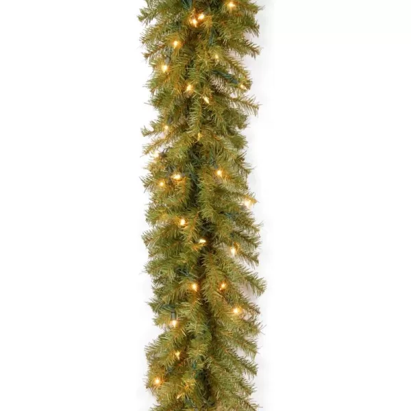 National Tree Company PreLit Artificial Christmas Garland Green Norwood Fir White Lights Plug In Christmas Collection 9 FeetGreen 9Feet by 12Inch