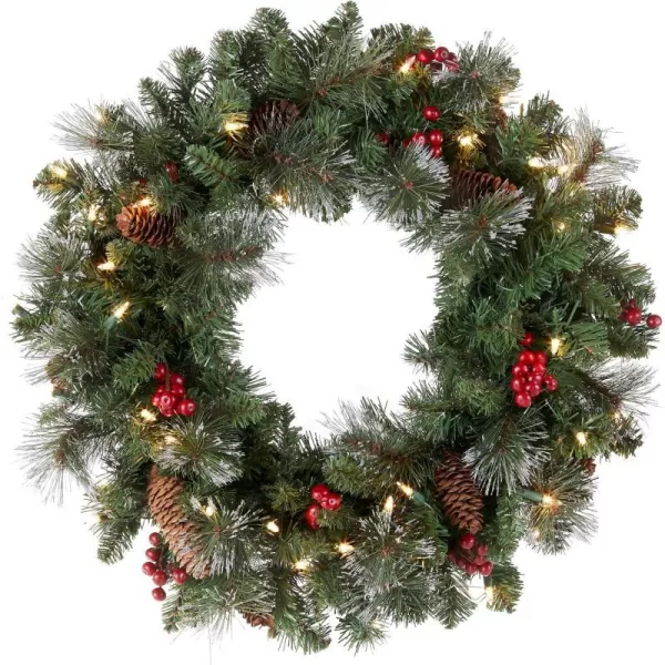 National Tree Company PreLit Artificial Christmas Wreath Green Crestwood Spruce White Lights Decorated with Pine Cones Berry Clusters Christmas Collection 24 Inches24 in Plug In