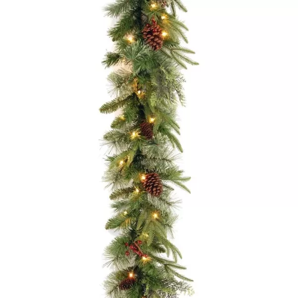 National Tree Company PreLit Feel Real Artificial Christmas Garland Green Colonial Fir White Lights Decorated With Pine Cones Plug In Christmas Collection 9 FeetChristmas Garland